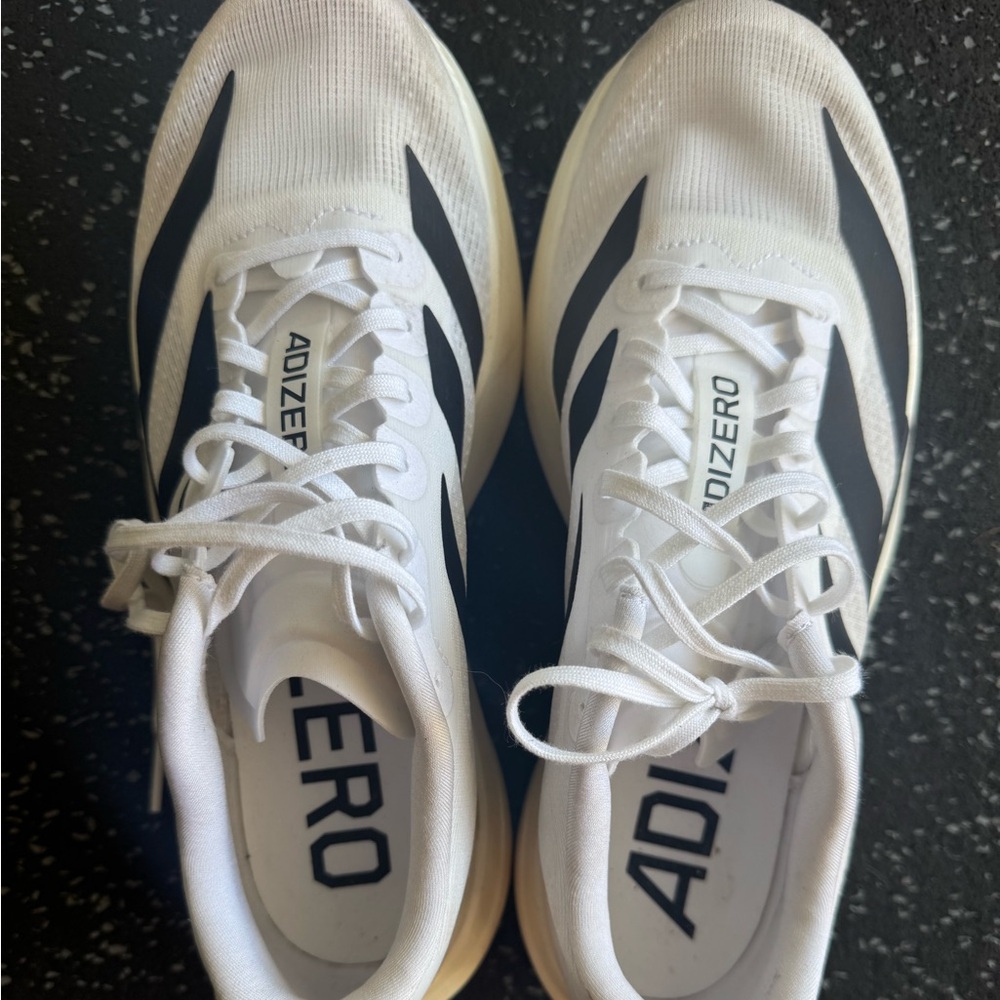 adidas Adizero White and Black Sneakers. Worn 4x total 15 miles on them.